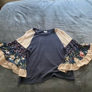 Adorable waffle knit long sleeve tee.